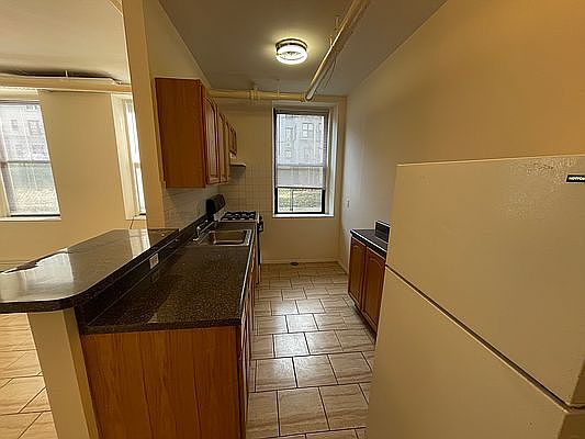 2nd image of 24-55 27th St #1A