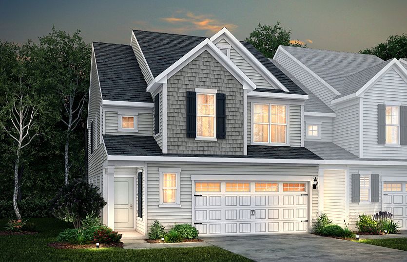 Palomino Exterior 1 features siding, shakes, covered front door and 2-car front load garage