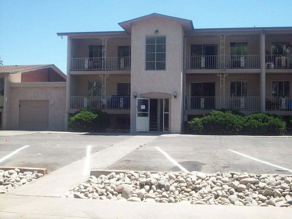 front of building. Unit is top left unit.
