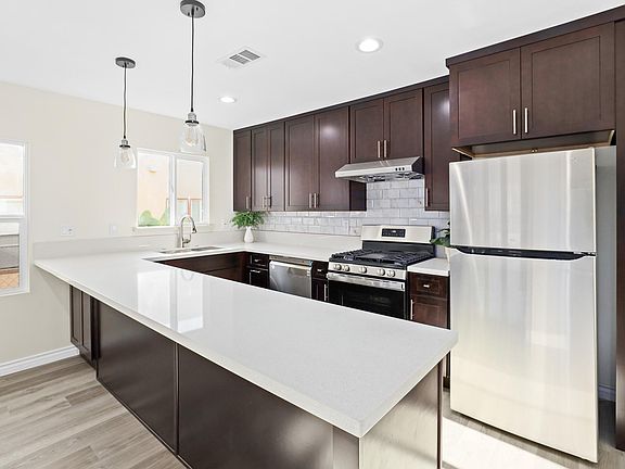 651 - brand new stainless steel appliances and cabinets