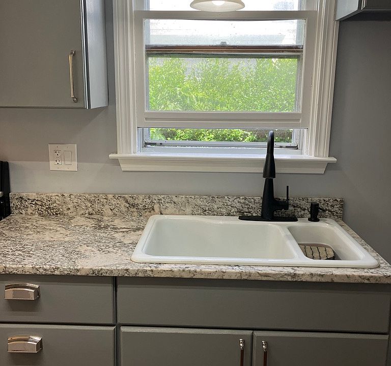 Newly renovated kitchen with granite and stainless steel appliances.