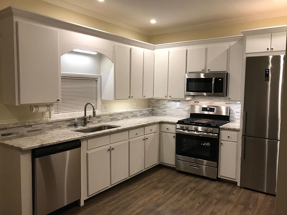 Renovated kitchen with new appliances + granite counters
