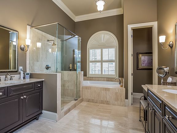Master bath with travertine