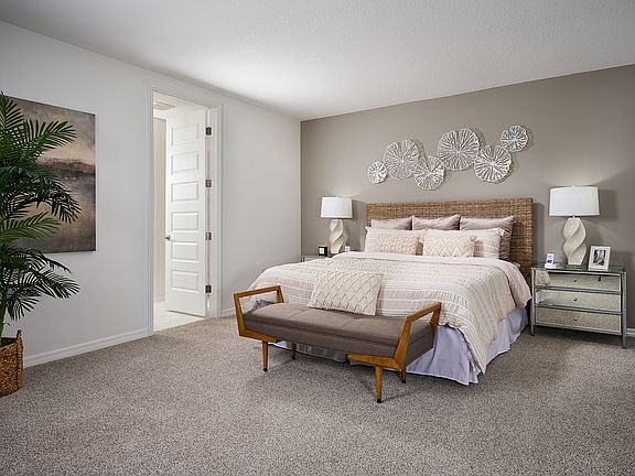 The Primary Bedroom of the Jasmine Model at Salt Meadows.