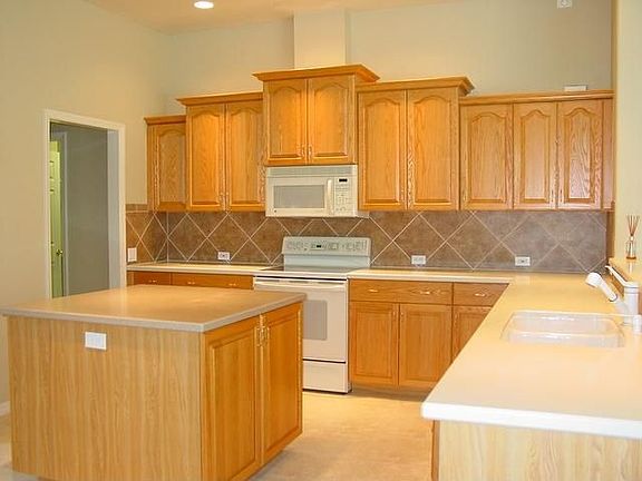 Custom Wood Cabinets, Tile Backsplash