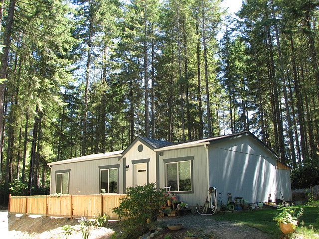 1st image of 221 NE Collins Lake Dr