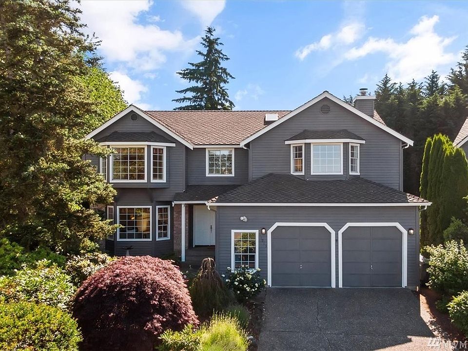 Welcome home! The 50-year roof was installed in 2003.
