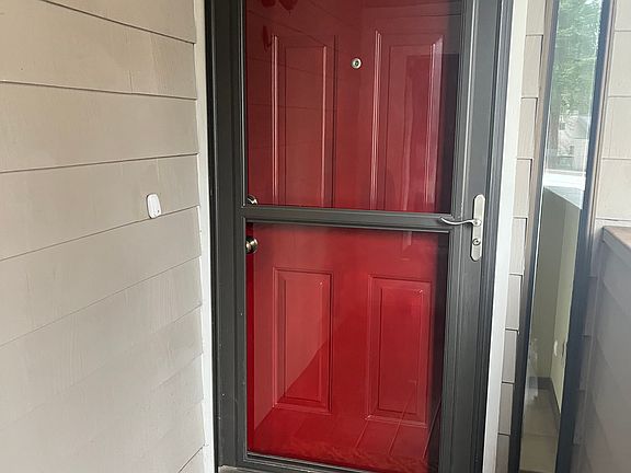 Front door at top of stairs