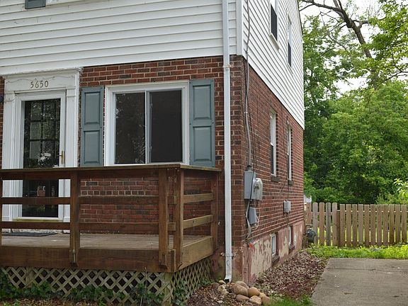front porch, two car driveway, fenced backyard, new siding