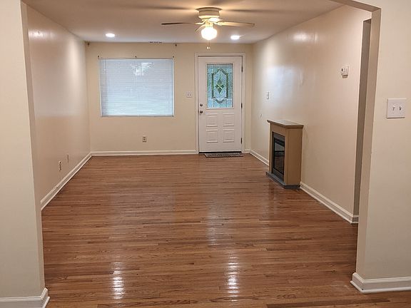 VIEW FROM DINING ROOM TO FRONT ENTRY