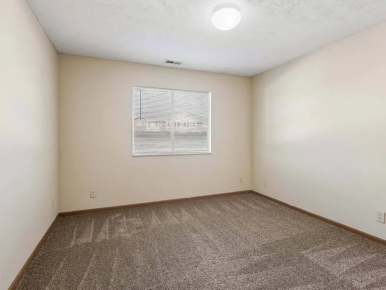 A bright and comfortable bedroom provides a peaceful retreat with a versatile layout ready to fit your lifestyle.