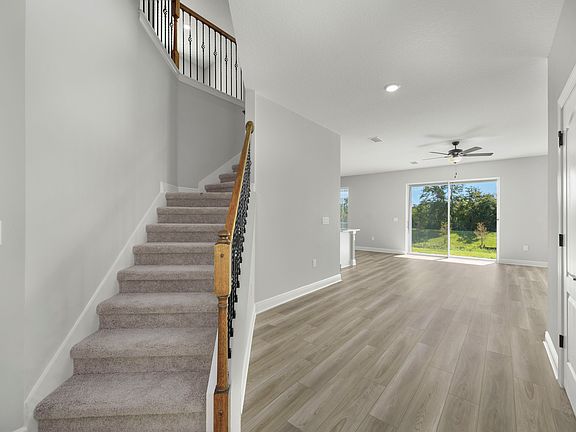 A foyer leads to family room
