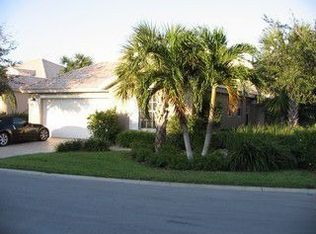1555 Whispering Oaks Cir, Naples, FL 34110