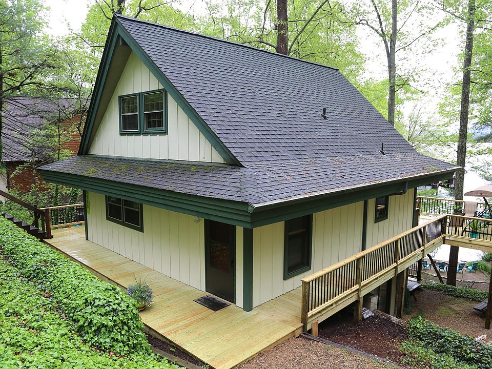 Lakefront 3 bedroom, 2.5 bath fully furnished home on Lake James. Has private deep water dock.