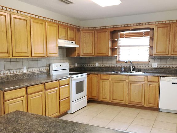 Kitchen with ceramic tile floor