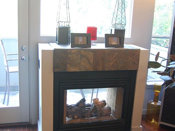 Gas Fireplace viewed from living room and patio