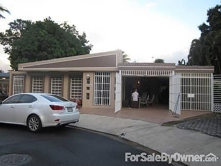 Front View
						:
						Electric garage door.