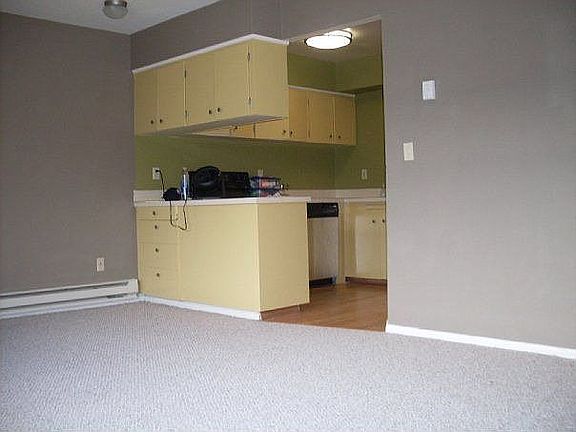 After, new carpet, paint, new resurfaced cabinets