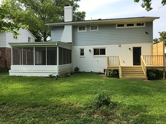 Large back yard, screened in back porch, and deck