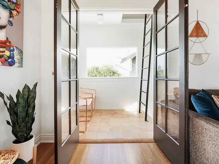 enclosed sun porch - with ladder to loft