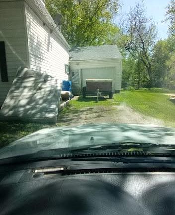 Off-street parking. Will have trailer and mattress removed this week