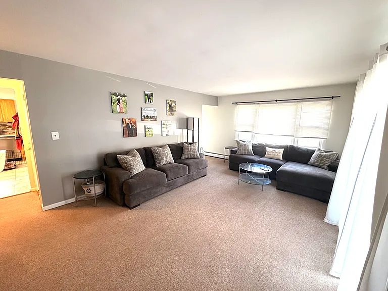 Massive living room big enough for pickleball!
