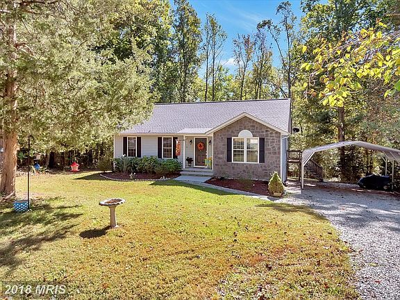 2-vehicle carport w/ sensor lights!