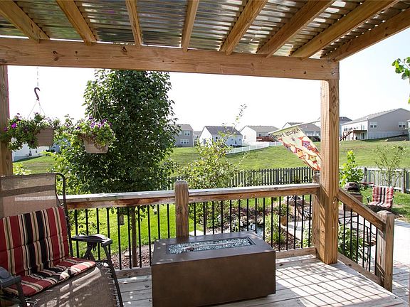 Walk out your sliding glass door to a covered 10'x12' deck. The yard backs up to common ground. So relaxing!