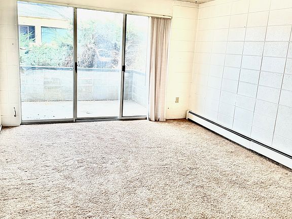 Living Room with sliding door exit to the patio