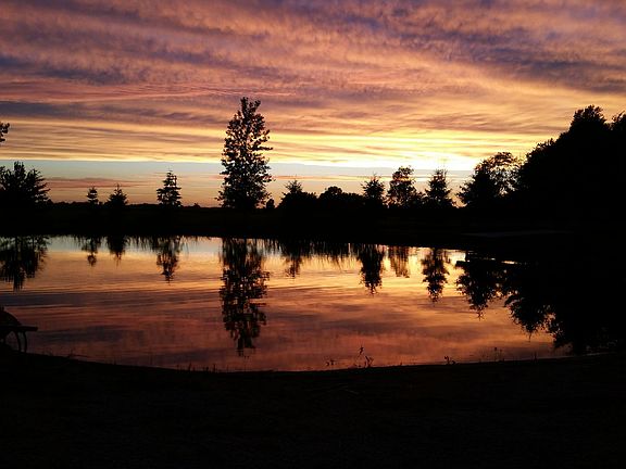 Enjoy sunsets by your pond!