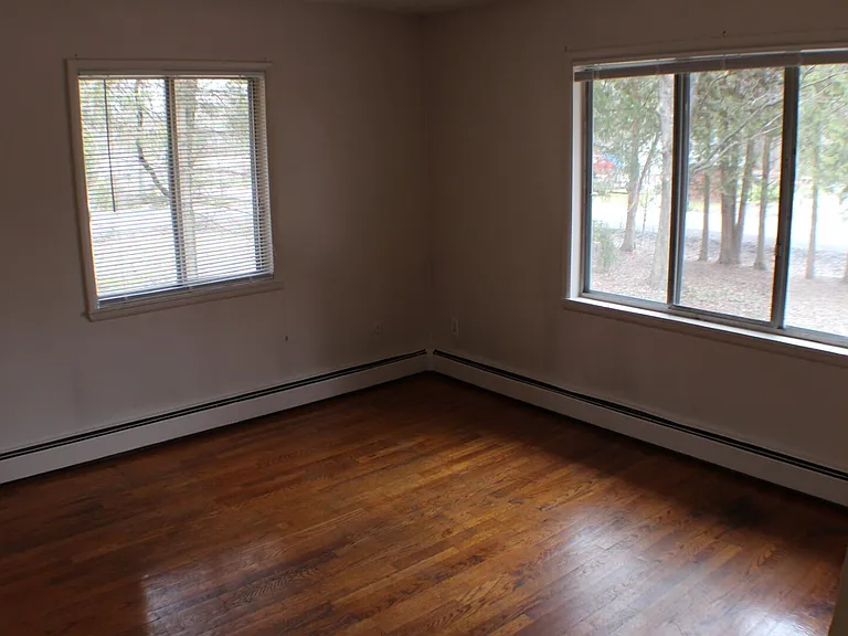 120 Sapsucker Woods Rd #1A — Photo 1