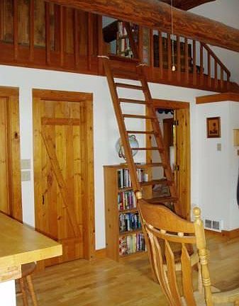 There is a loft that overlooks main room. Doors are custom.
