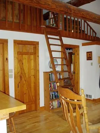 There is a loft that overlooks main room. Doors are custom.