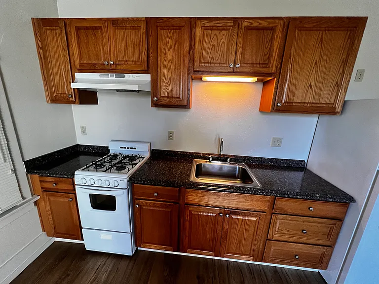 Kitchen range, sink and cabinetry