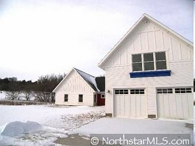 View from the left of garage and back guest bedroom