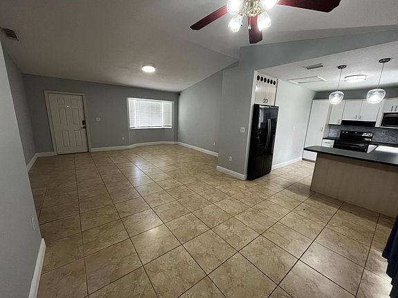 View of the Living room, dining room and Kitchen.