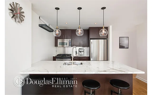 Sold by Douglas Elliman | media 13