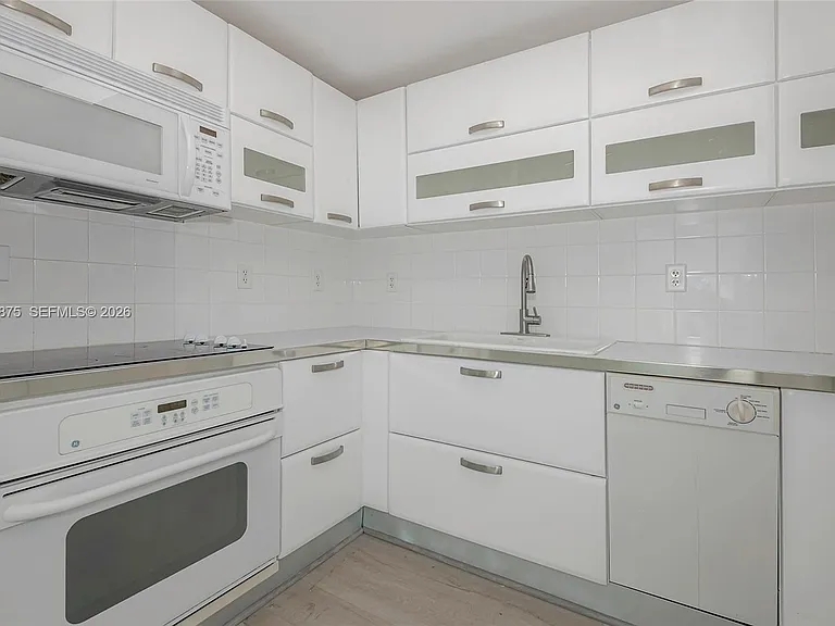 6580 Indian Creek Dr #310 — Photo 3