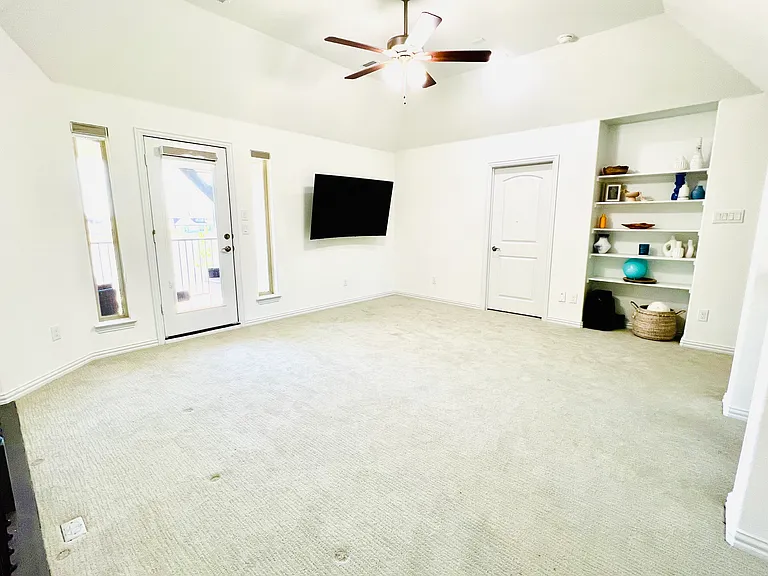 Game room with direct access to a balcony offering stunning lake views