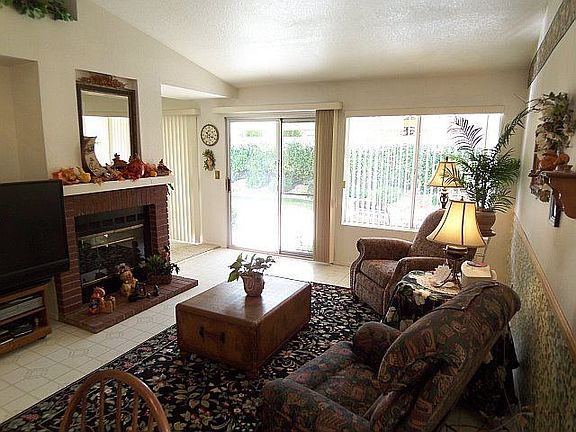 Two Way Fireplace is shared with Formal Living Room. This Family Room is WoW!
