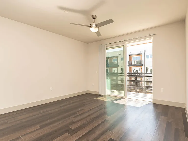 Living Room with Balcony and Hard Surface Flooring