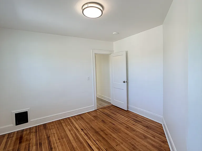 Third bedroom left of bathroom