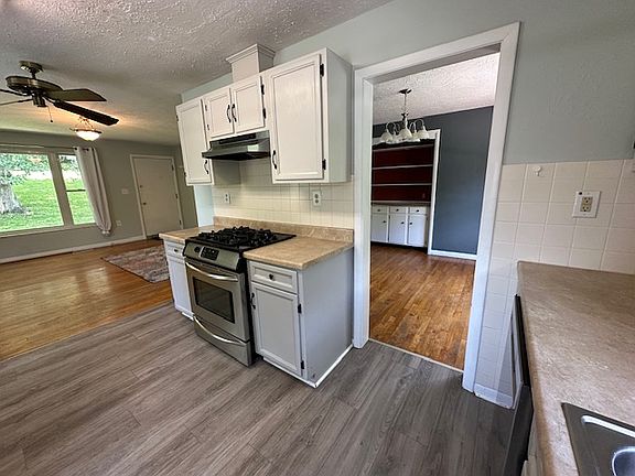 Kitchen with peek to dining and living areas