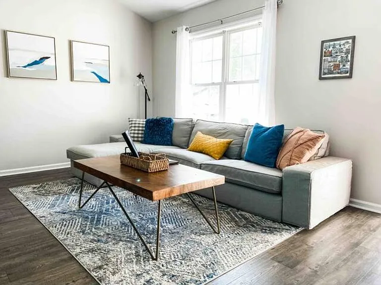 Living room has vaulted ceiling