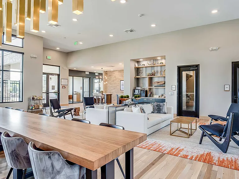 The clubhouse at The Wright offers flexible seating, lounge areas, and shared gathering spaces designed for community events, casual meetings, or everyday relaxation.
