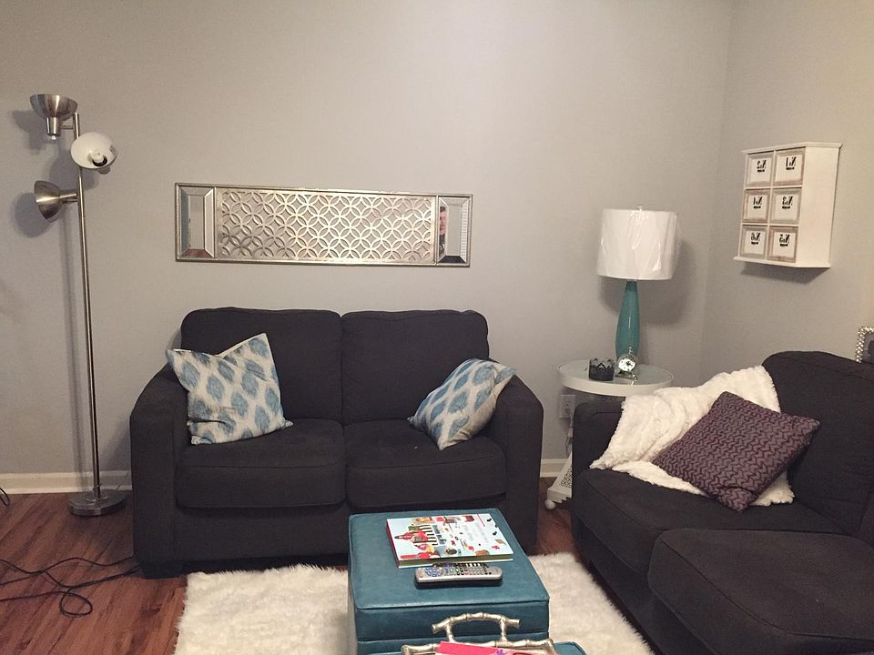 Sample of den, available unit has carpet