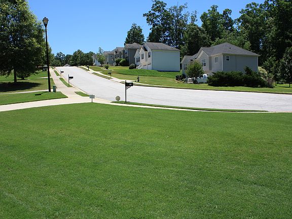 FRONT YARD LOOKING UP STREET