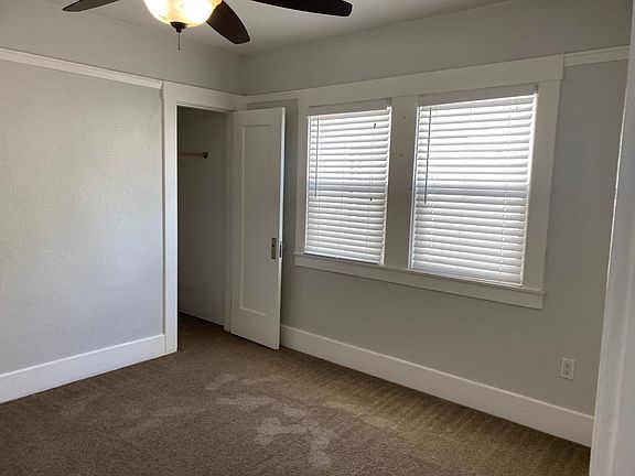 downstairs front bedroom with walk-in closet