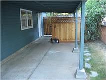 two deep, one wide carport. spacious driveway with extra parking