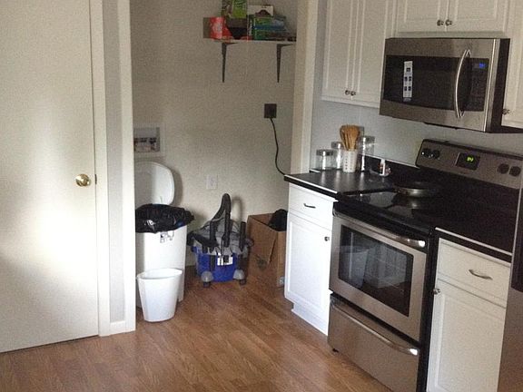 Utility closet with stacked washer/dryer (not shown)